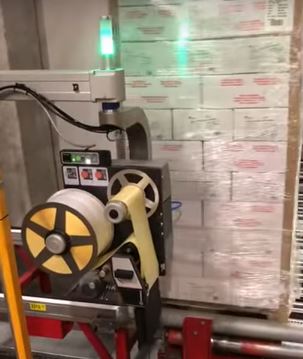 Pallets being labelled in cold storage