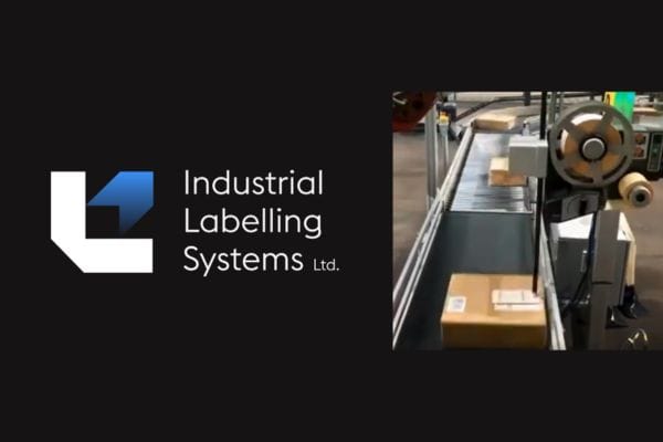 Video thumbnail - Industrial Labelling Systems logo is on the left. On the right is an Evolabel machine applying labels to cardboard boxes on a production line.