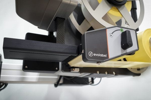 Close up of Evolabel QuickTamp Airless label applicator
